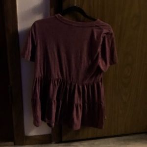A maroon top
